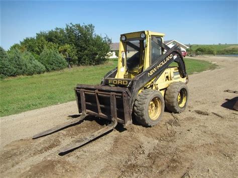 l555 skid steer specs|new holland l555 engine.